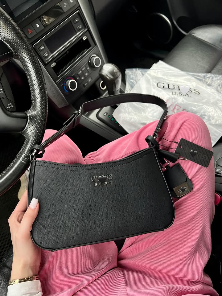 Елегантний багетик з еко-шкіри з регульованим ремінцем